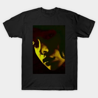 Beautiful girl face in dark lighting. Yellow green light, red tones. Dark and beautiful. T-Shirt